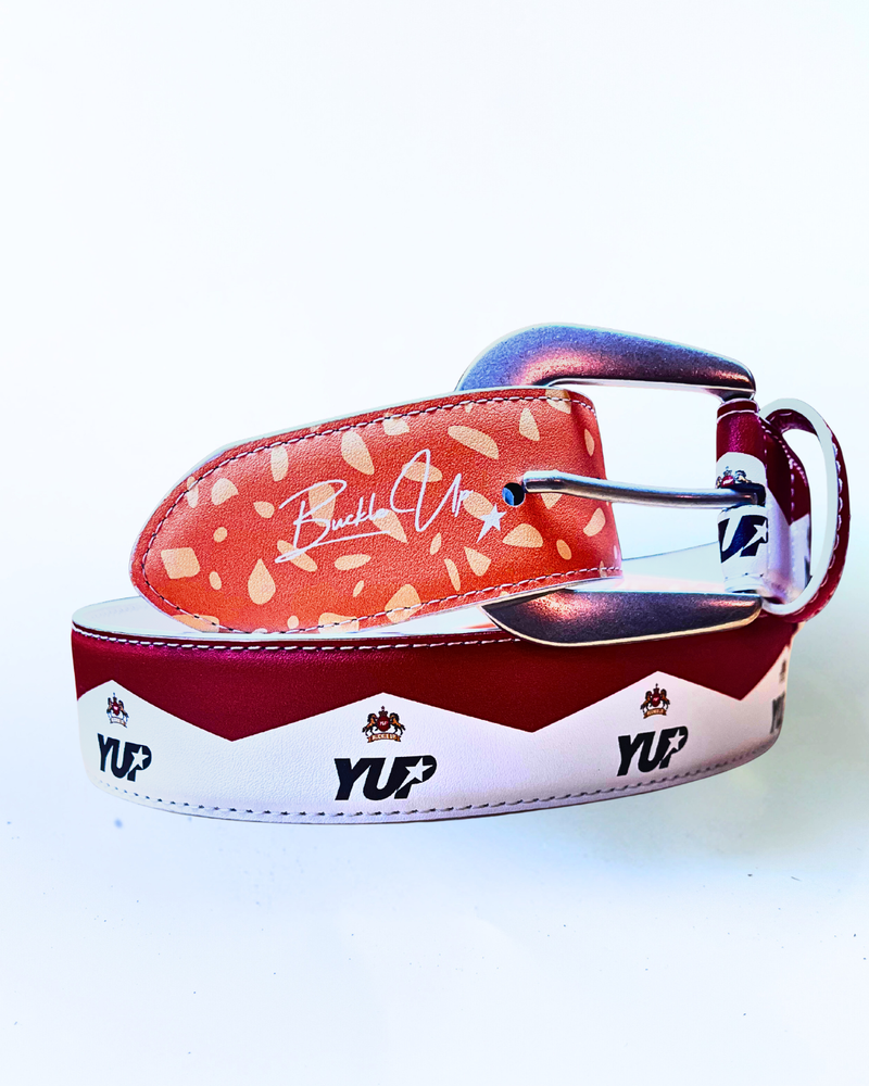 Red and white belt with floral pattern and visible branding on a light gray background