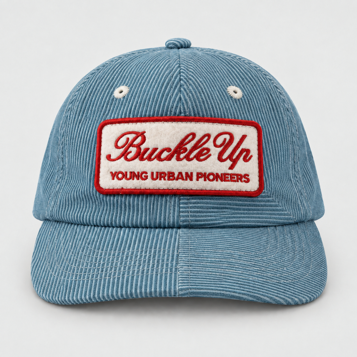 DAYDREAM blue six-panel cap — front view on light grey background